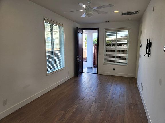 view from living room leading to main entry door