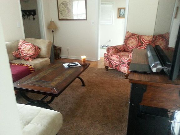 Living Room with foyer alcove entrance