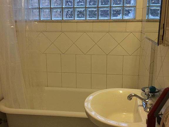 Bathroom with claw foot tub
