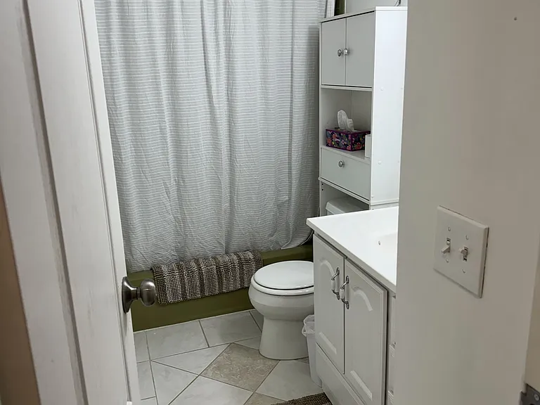 Bathroom across hall from Available Bedroom