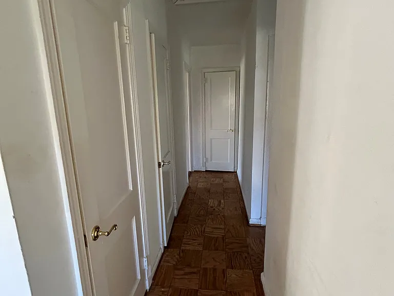Hallway with lots of closet and storage space