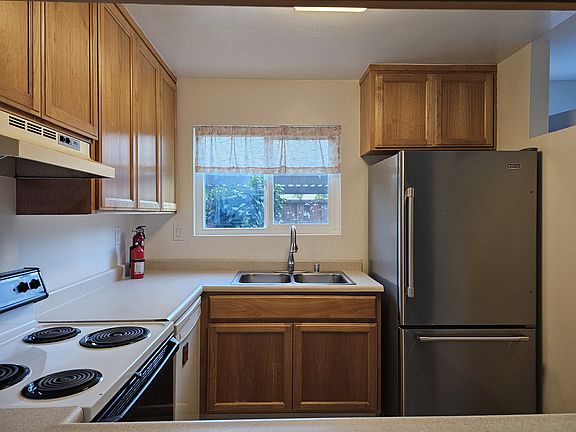 The kitchen. Electric stove, dishwasher, and new refrigerator.
Microwave, supplied by you, if desired.