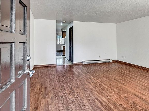 Front door to spacious living room