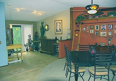 Main level is spacious & bright, new tile, carpet & paint