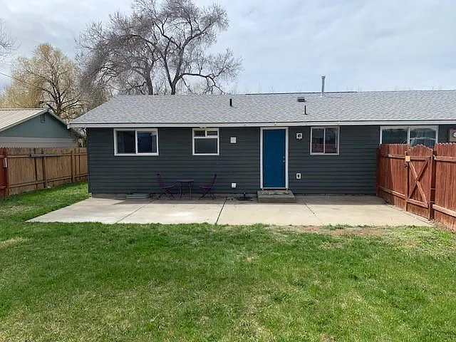 Back Yard Fully fenced in and off street parking spaces