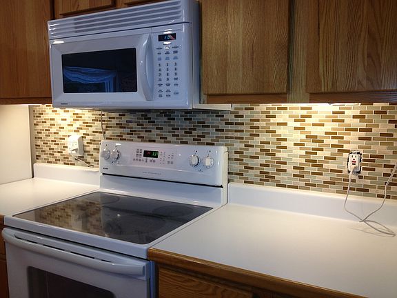 Glass and stone backsplash
