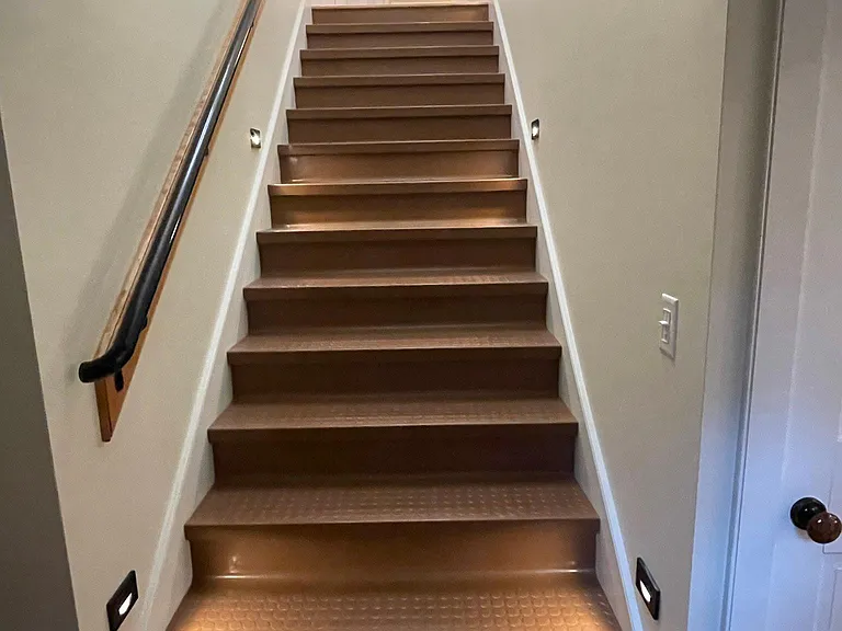Stairway has night lights and non-slip natural rubber flooring
