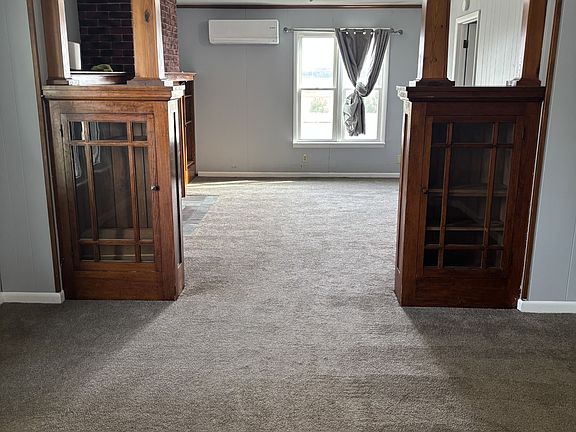 Front entry room leading into living room.