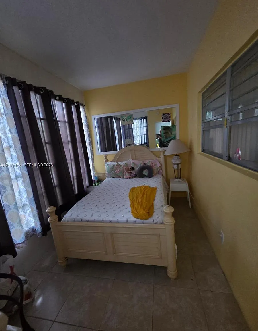Quinsana Gardens Condo — Photo 4