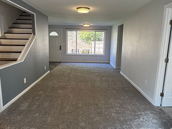 Livingroom, facing the front of the house. This room features mini-split (heating & air conditioning).