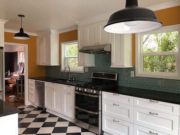 Complete remodeled kitchen in 2018! New gas range and double oven, quartz countertops, spice drawer, under counter lighting, new windows, new dishwasher and touchless faucet with garbage disposal.