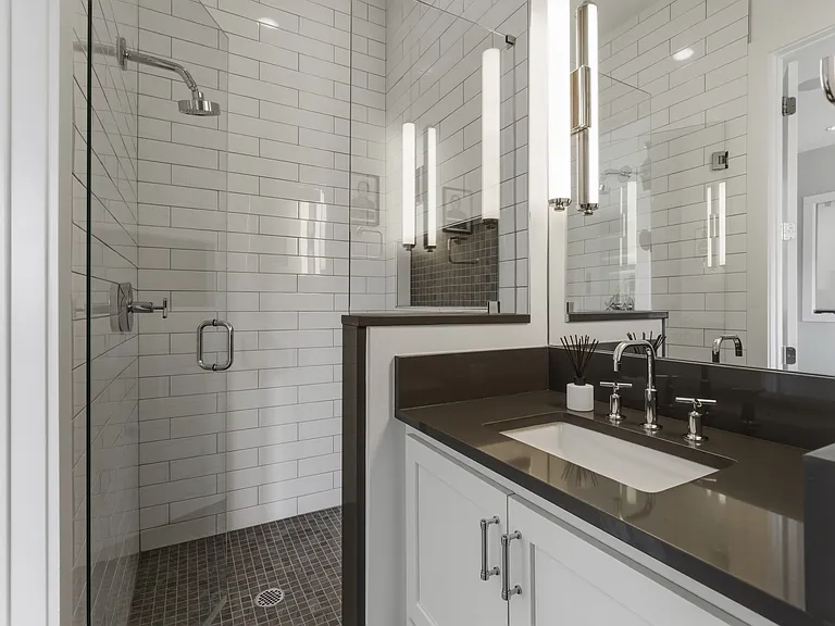 Bathroom #3 is attached to the upstairs game room with a stand alone shower.