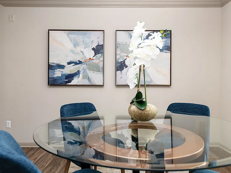Dining area with hardwood-style flooring