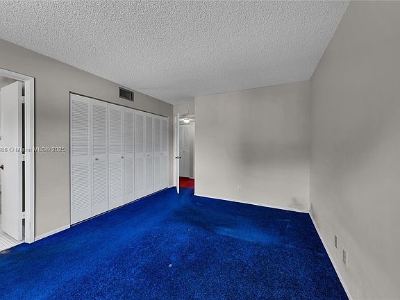 4th image of 313 Gardens Dr APT 203