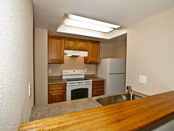 Looking through the kitchen pass through. Remodeled and bright! A nice contemporary finish for the o