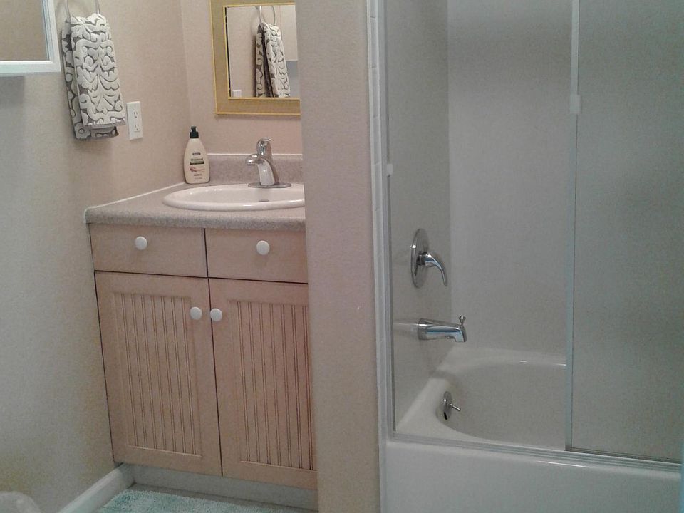 Full bath with tub and shower.