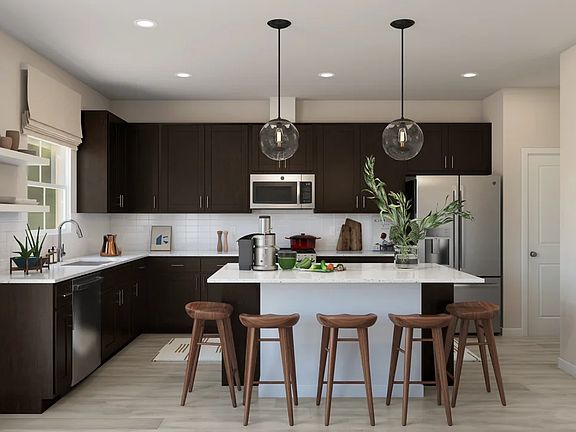 Kitchen with center island and pendant lighting