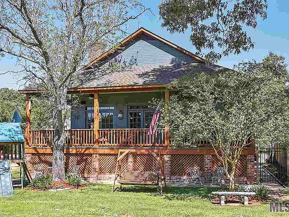 Covered Wrap Around Porch Overlooking Beautiful Views