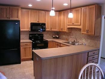 Beautiful hickory cabinets and appliances were installed in 2007 and are like new.  Plenty of counterspace for cooking and ceramic tile floors.