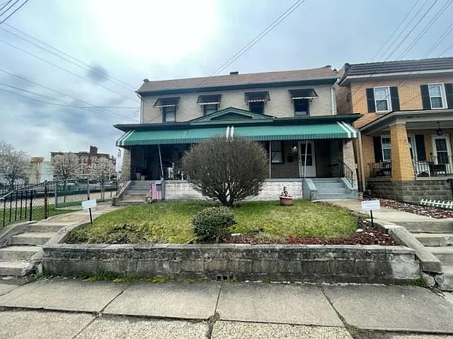 7442 Irvine St — Photo 2