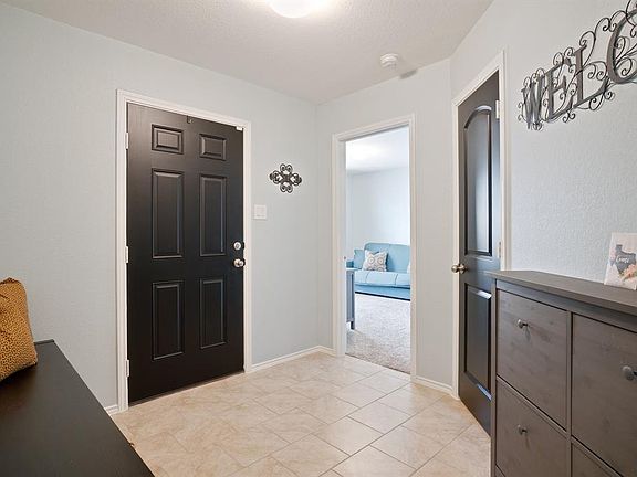Foyer from the hallway looking back at front door.