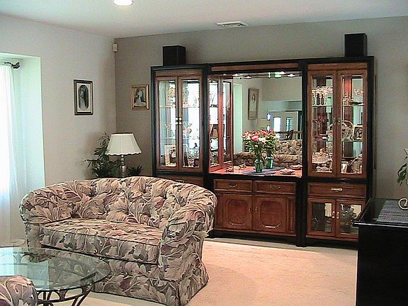 Large windows flood the room with natural light.