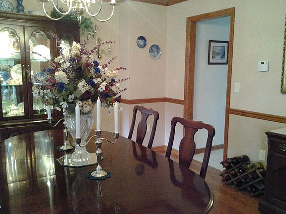 Formal dining room with hardwood floor