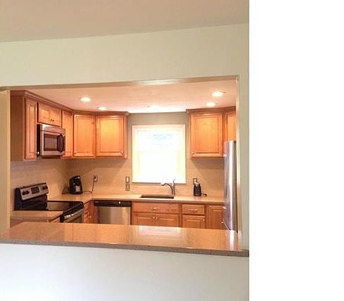 The kitchen is open to the ...