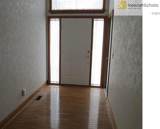 Impressive entryway. Hardwood floors - tall ceiling!