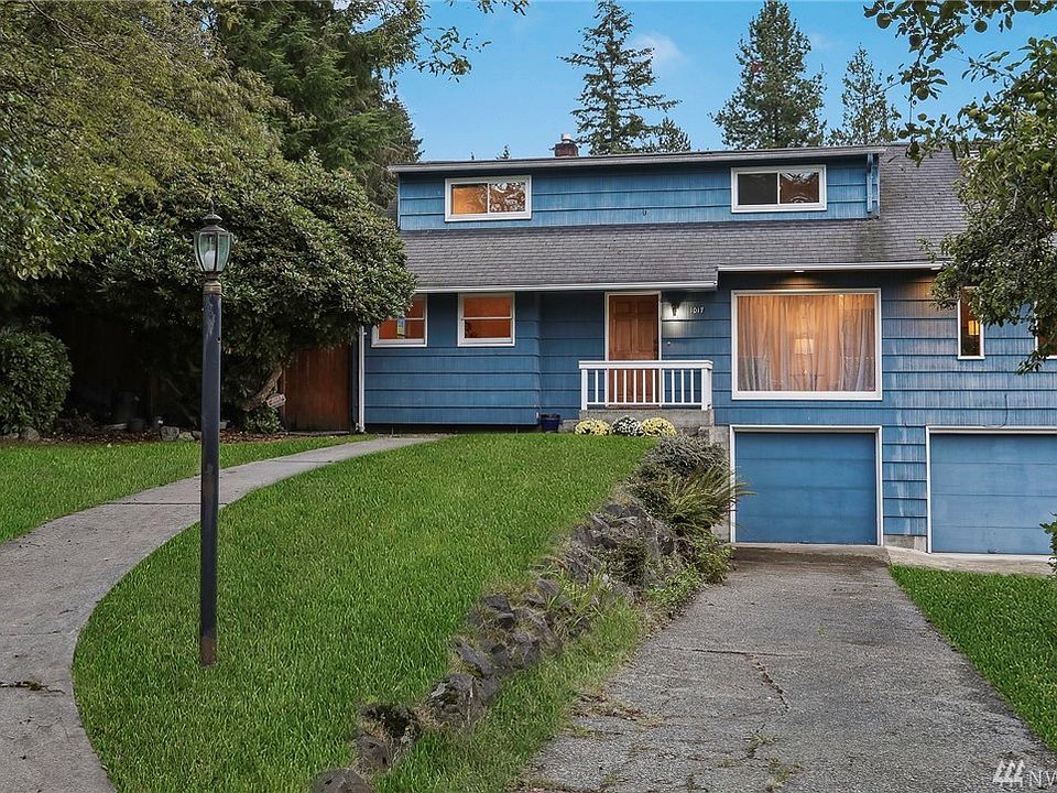 Welcome home to this gracious home just 3 blocks from the future light rail station at 185th.  