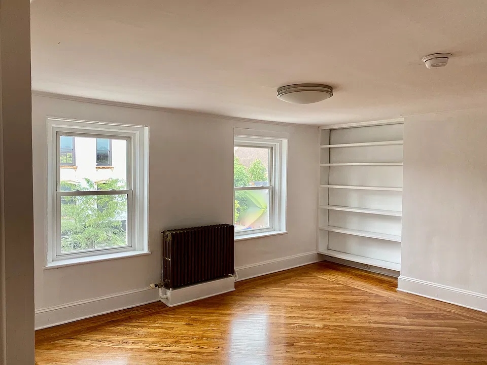 Large living room with built ins.