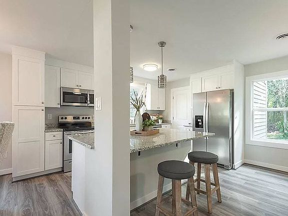 Furnishings pictured are not included