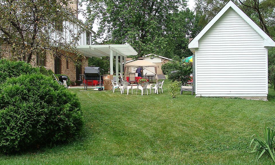 Rear yard including storage hoouse