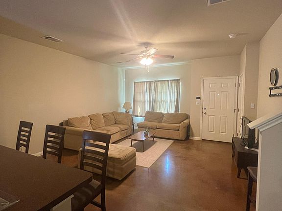 another view of the living room / dining room