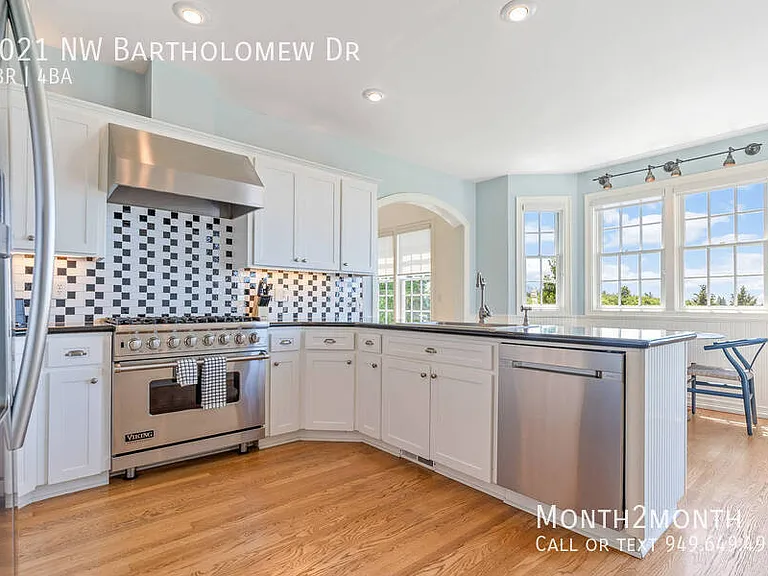 9021 NW Bartholomew Dr — Photo 21