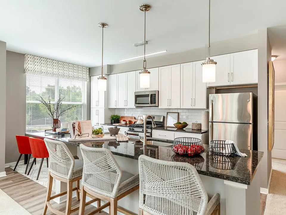 Modern kitchens with solid wood cabinetry, granite counters and stainless appliances