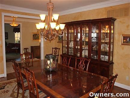 The elegant dining room seats 16 easily.