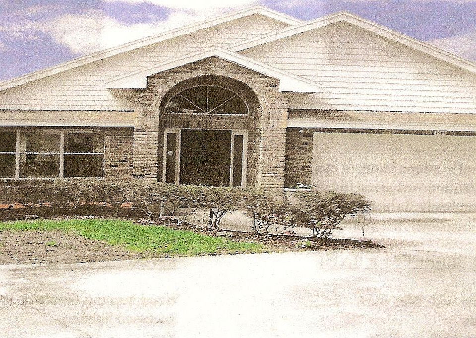 Front of beautiful Golf Course house