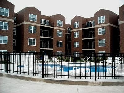 The back with a pool and hottub