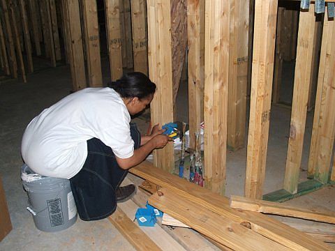 Ms. Briggs installing plugs 