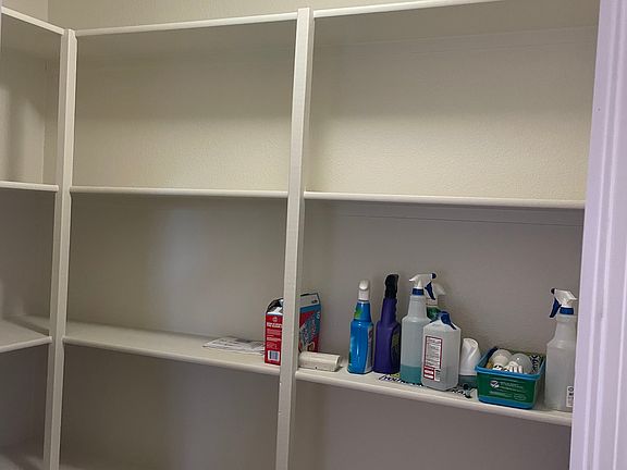 Open pantry off kitchen.