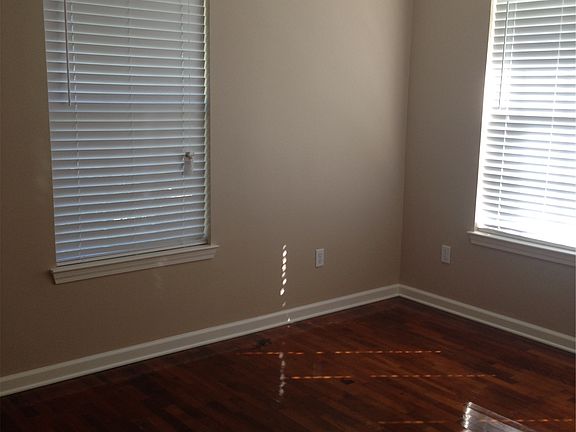 Secondary bedroom with refinished hardwood floors