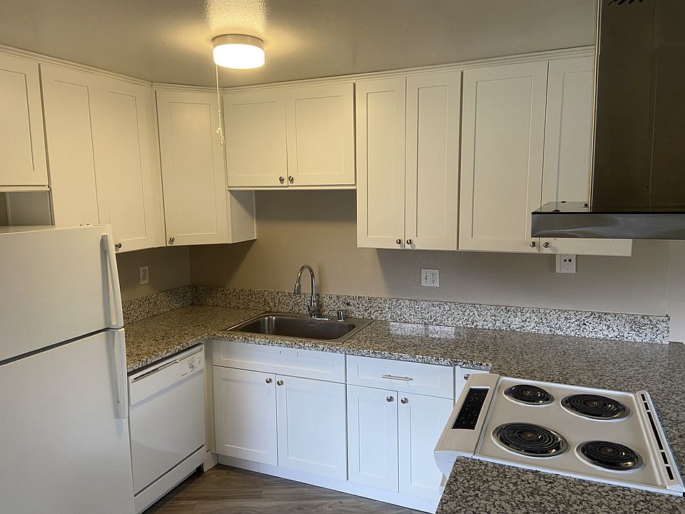 Soft close cabinets_ lots of storage space_ lots of counter space_ dishwasher_refrigerator_ oven- all electric_ all full sized.