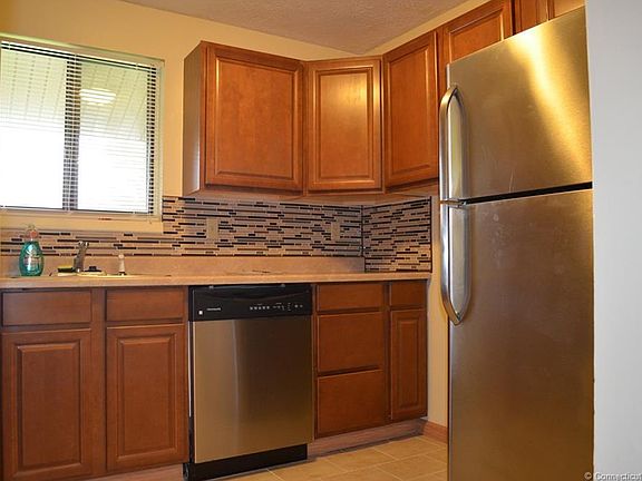 Nicely maintained kitchen with stainless steel appliances and plenty of cabinet space