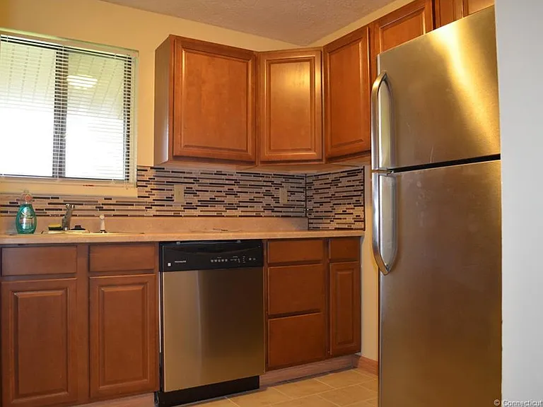 Nicely maintained kitchen with stainless steel appliances and plenty of cabinet space