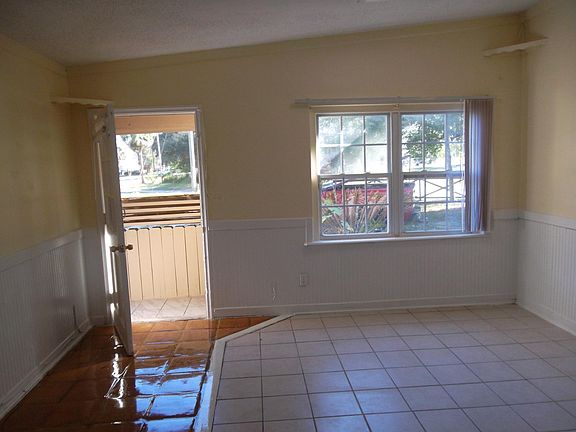Looking from kitchen toward front entrance.