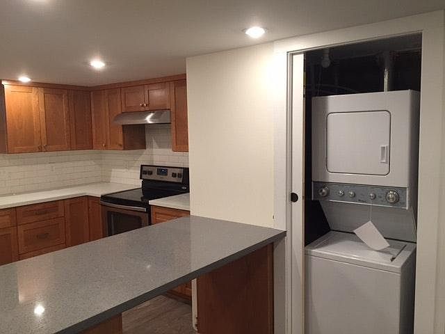 Quartz counters and hidden laundry