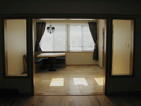 Sunroom w/ travertine floors