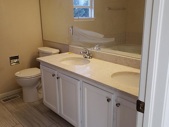 New tile floor, vanity & light fixture!