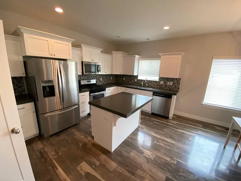 Large kitchen, has a nice island as well. Comes with the refrigerator.